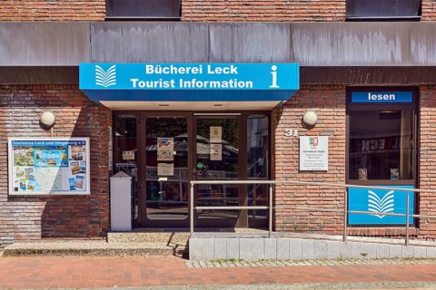 Tourist information, library leak, public library, commercial building, brick building, entrance