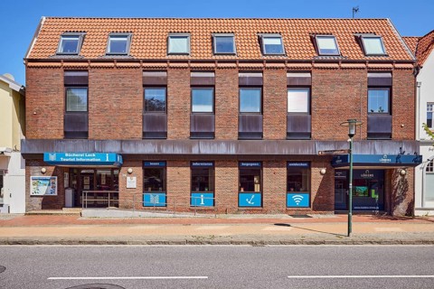 Tourist information, library leak, public library, commercial building, brick building, façade with