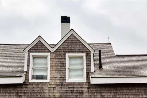 Facade detail, house with wooden shingles, typical architectural style, dormer window, Highland