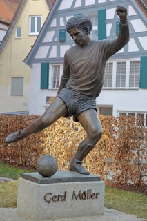 Memorial to soccer player Gerd Müller, German national team player, soccer legend, bronze