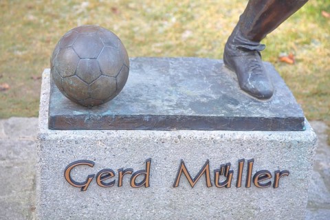 Memorial to soccer player Gerd Müller, German national team player, soccer legend, bronze