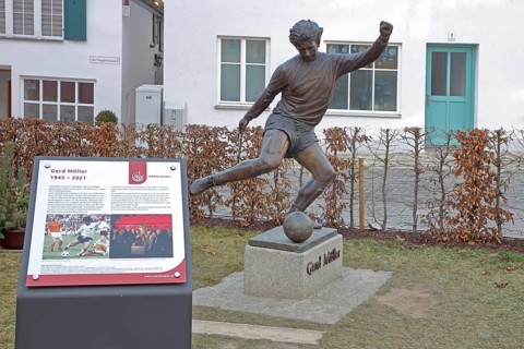 Memorial to soccer player Gerd Müller, German national team player, soccer legend, bronze