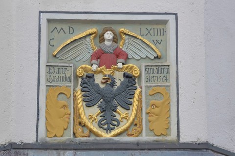 City coat of arms at the former Holy Spirit Hospital building built in 1564, inscription, year,