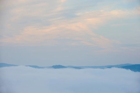 Early fog low-lying clouds in low mountain ranges, Germany