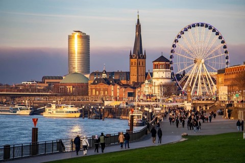 Rhine promenade in Düsseldorf, Ferris wheel, old castle tower, St. Lambert Basilica, old town, ERGO