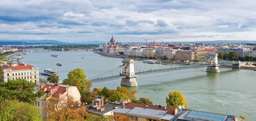 Hungarian parliament along the Danube River and Chain Bridge, Budapest, Hungary