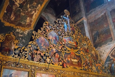 Detailed church paintings with golden decorations and iconic representations in a church, Bodbe