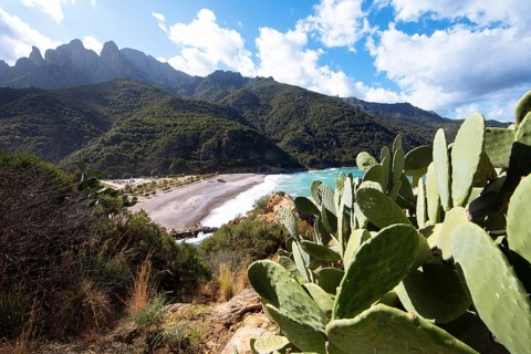 View of the pebble beach and Porto Bay, a UNESCO World Heritage Site, Ota, west coast of Corsica,