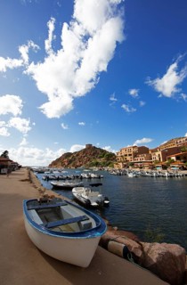 Boats in Port de Porto or Port of Porto on the Porto River, behind the Genoese Tower, Porto, Ota,
