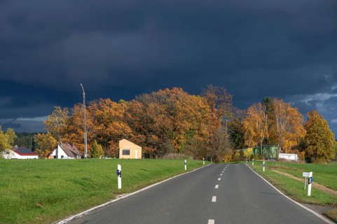 Stormy sky with autumn trees, Neunhof bei Lauf, Middle Franconia, Bavaria, Germany