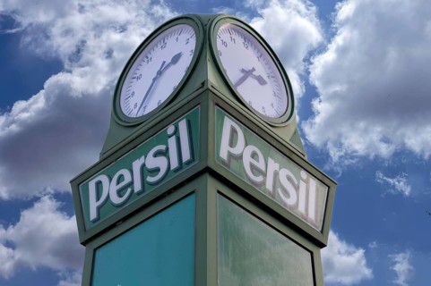 Detail of the persimmons clock, neon sign for the Henkel company, this historic persimmon clock was