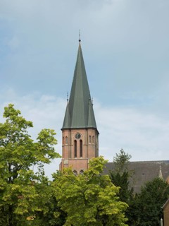 The mighty church spire, St. Anthony's Church, Papenburg, Emsland, Lower Saxony, Germany