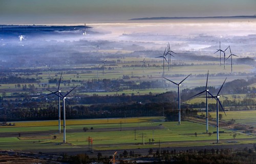 Wind turbine and high-voltage masts, view from Bergedorf to Geesthacht