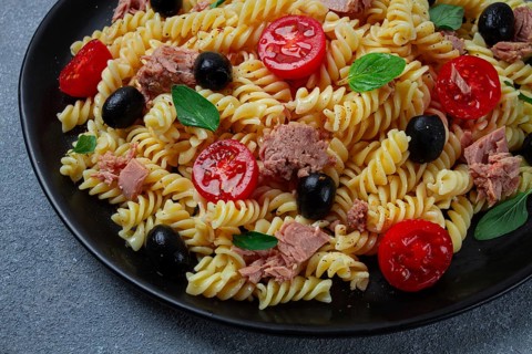 Tuna salad, fusilli pasta, olives and cherry, olive oil, homemade
