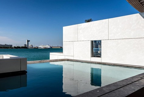 Interior design in Louvre Abu Dhabi, art museum by French architect Jean Nouvel, buildings on