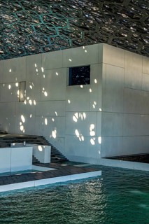 Interior design in Louvre Abu Dhabi, art museum by French architect Jean Nouvel, buildings on