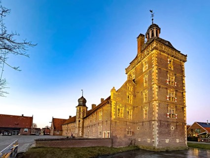 Observatory Tower of Raesfeld Castle stands in Wassergraben behind part of Vorburg, Raesfeld Water