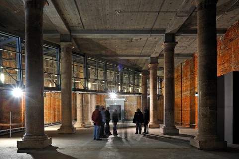 Small column hall, with group of visitors, the unfinished NS Congress Hall, 1943, deliberately