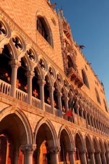 Sun rays at sunrise on the façade of the Doge's Palace, Venice, Veneto, Italy