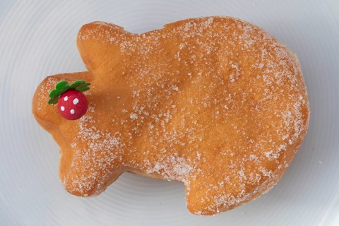 Traditional lucky pig cake served on a plate, as a sweet New Year's pastry and symbol of good luck