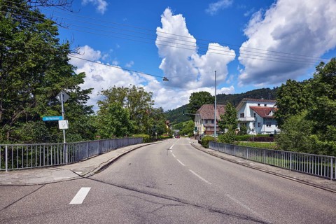 Car bridge and footbridge, metal railings, general architecture, houses, sidewalk, road, lanes,