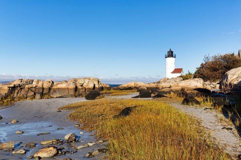 Annisquam Harbor lighthouse lighthouse, rocky coastline, historic Wigwam Point in Gloucester, Cape