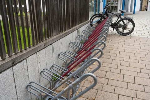 Several bike racks next to each other, bikes on bike racks, Bavaria, Germany