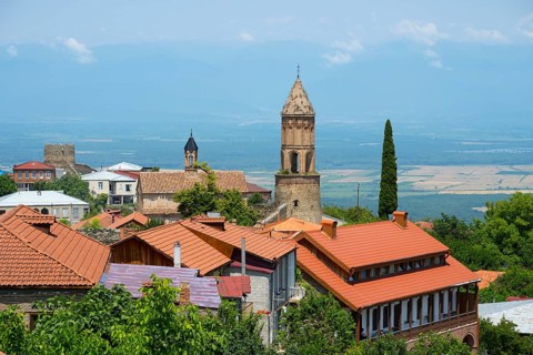 View of an urban landscape with a church tower and views to the horizon, Church of St. George,