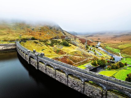 Autumn over Claerwen Dam, Claerwen Valley, Elan Valley Reservoir, Rhayader, Powys, Wales, UK