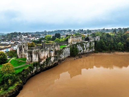 Autumn over Chepstow Castle and River Wye from a drone, Chepstow, Monmouthshire, Wales, UK