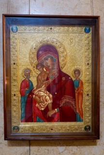 Icon of the Mother of God and Child, set in an ornately decorated golden frame, Sameba Cathedral,