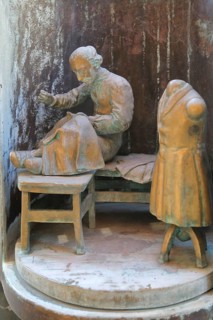 Tailor working clothes at Bonifatius Stirnberg's guild fountain 1983, modern art, bronze sculpture,