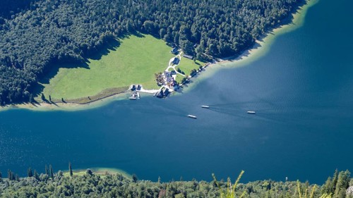 Deep view from Feuerpalfen of Lake Königssee with St. Bartholomä and some ships, Berchtesgaden