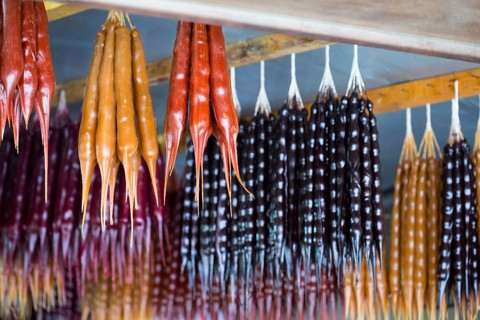 Hanging traditional Georgian sweets made from dried fruits and nuts, Churchkhela, Georgian