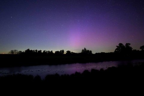 Aurora borealis aurora borealis on the Hunte dyke, Dümmerniederung nature park Park, Lower Saxony,