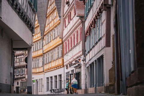Narrow street with numerous half-timbered houses in the old town, Herrenberg, Böblingen district,