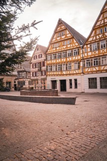 Charming half-timbered houses surround a quiet square, relaxed atmosphere, Herrenberg, Böblingen