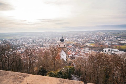 Extensive city view with a church tower in the foreground and a wide landscape, Herrenberg,