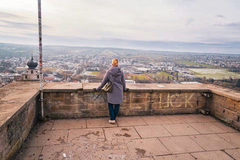 Quiet scene with a woman looking at the wide panorama from a platform, Herrenberg, Böblingen
