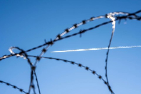 Symbolic picture security at the airport, outer fence at Düsseldorf International Airport, steel