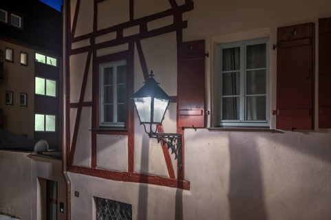Old lantern on an old half-timbered house, Nuremberg, Middle Franconia, Bavaria, Germany