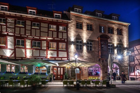 Historic residential buildings in Irrerstraße in evening lighting, Nuremberg, Middle Franconia,