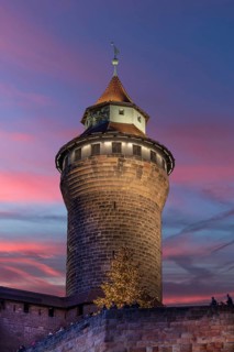 Historic Sinwell Tower, in the evening sky, built in the 13th century, Kaiserburg, Nuremberg,