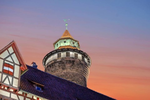 Sinwell Tower built in the 13th century, on the Nuremberg Kaiserburg in the evening lighting,