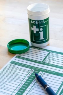 Emergency box in a refrigerator, it contains a comprehensive information sheet which gives