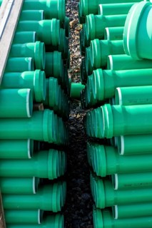 Symbolic picture construction site, sewage pipes for dirty and rainwater, for installation in the