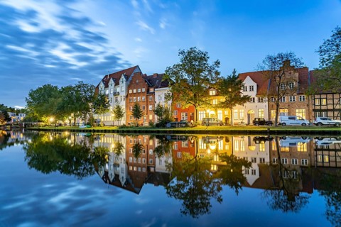 Lübeck's old town and the river Trave at dusk, Lübeck, Schleswig-Holstein, Germany