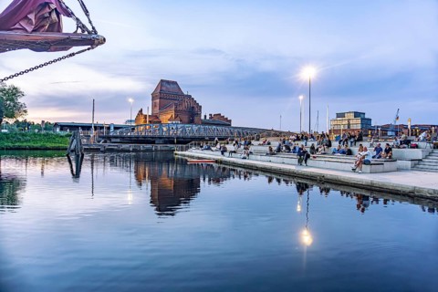 The water staircase at Museumshafen and the Trave at dusk, Lübeck, Schleswig-Holstein, Germany
