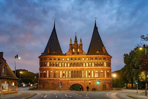 The Holsten Gate at dusk, Lübeck, Schleswig-Holstein, Germany