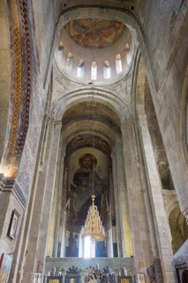 An impressive vaulted ceiling with frescoes and a depiction of Christ in a church, Svetitskhoveli
